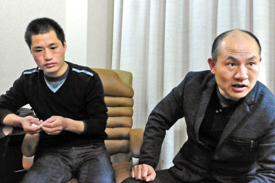 張輝、張高平（右）接受本報記者采訪 蔣錚 攝